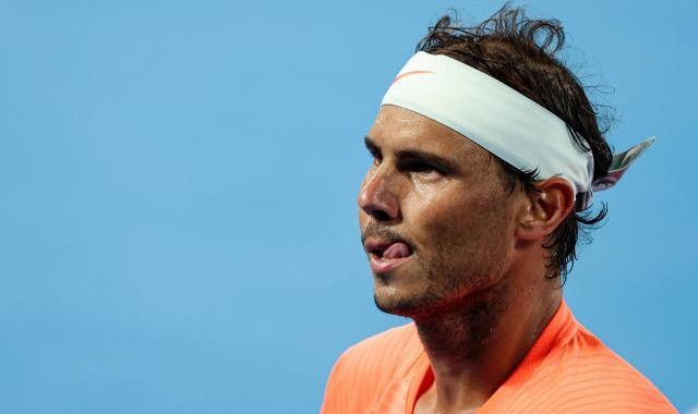 足球即时比分-纳达尔不丢一盘打入16强 从带伤作战到夺冠大热